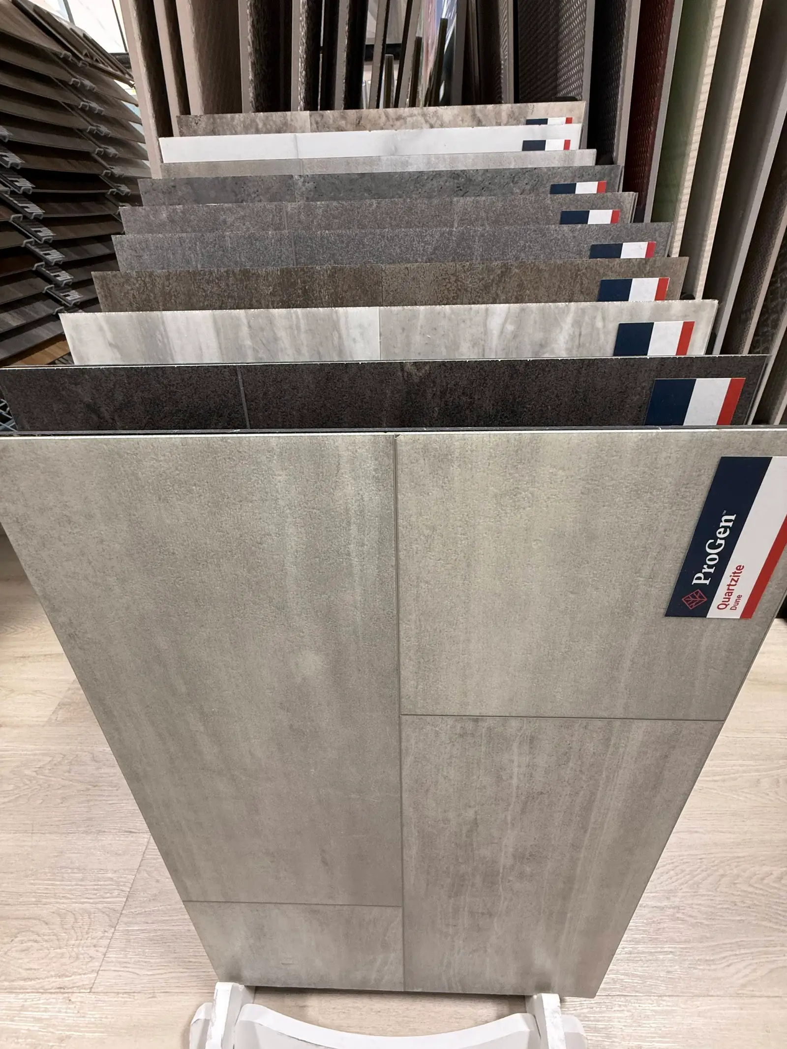Large-format porcelain floor tile sample in grey