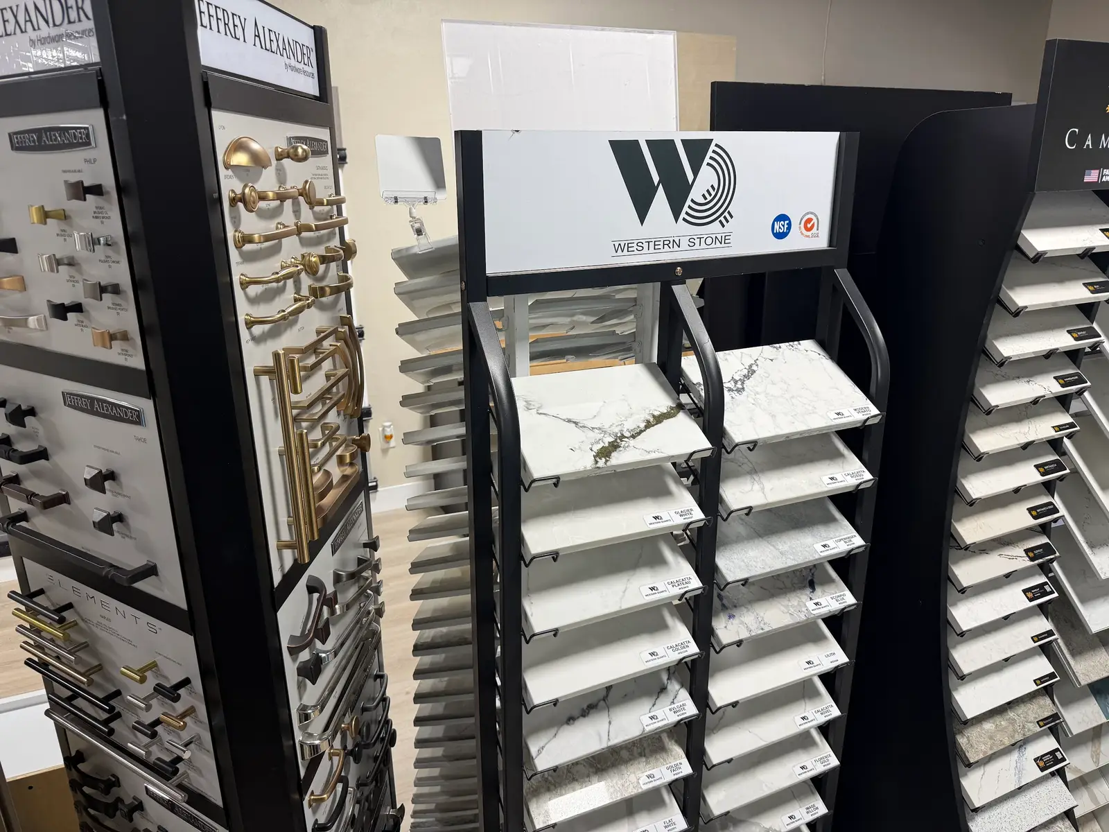 Quartz sample display with cabinet hardware on the adjacent wall