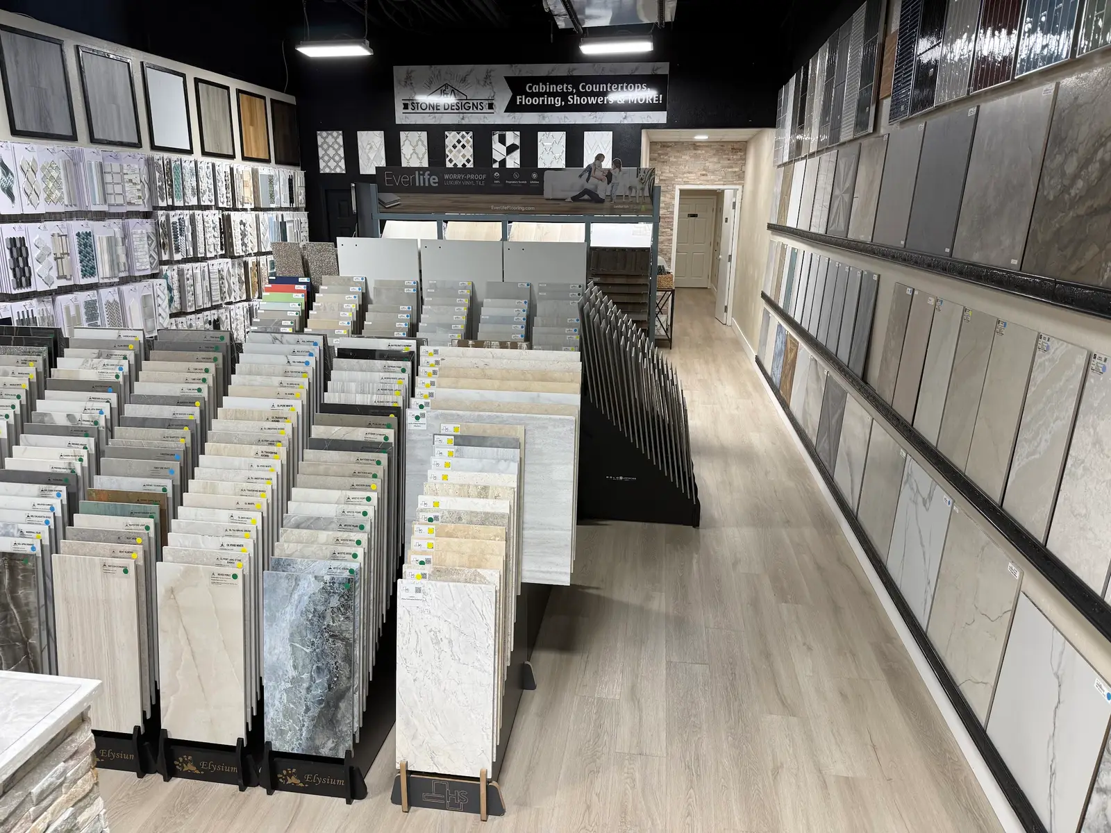 Aisle of tile and flooring samples in the Lakeland showroom