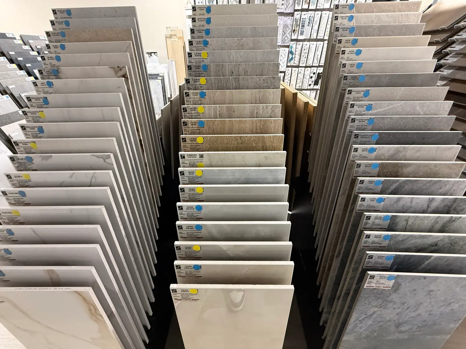 Porcelain floor tile sample racks in light stone looks