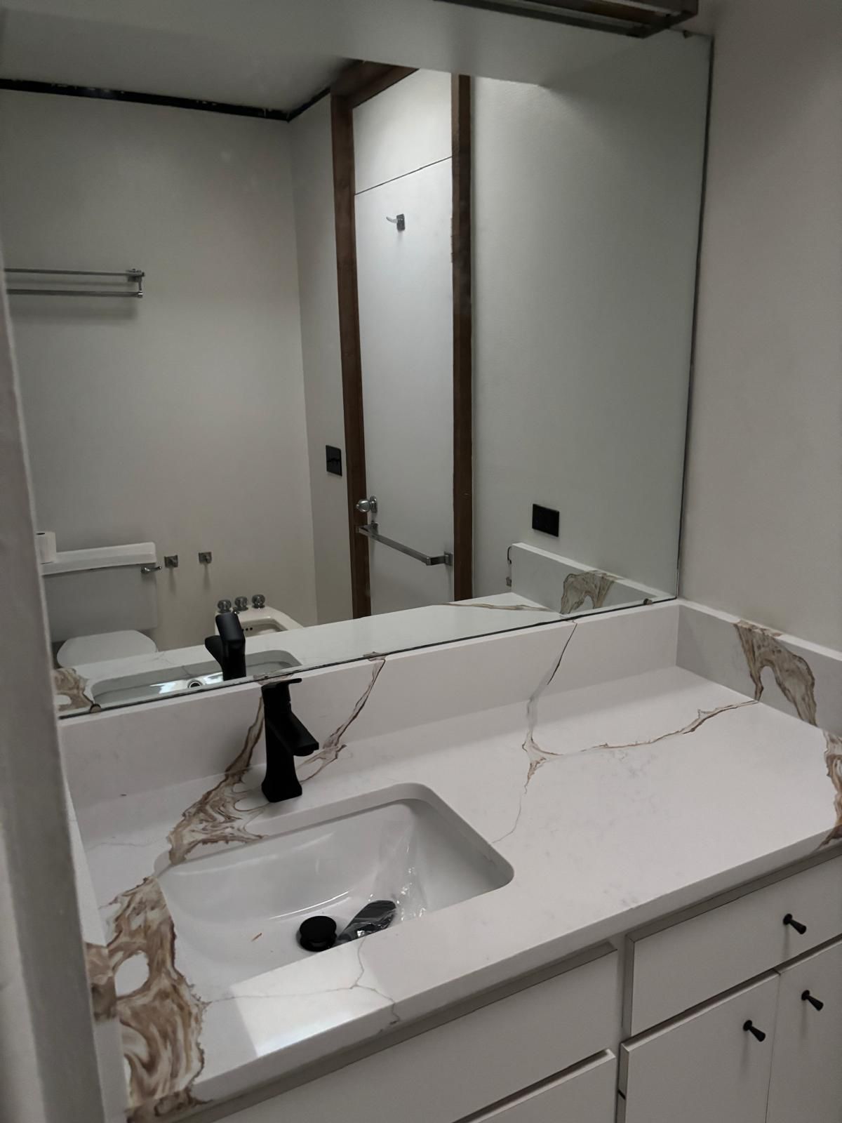 After: Quartz bathroom vanity install
