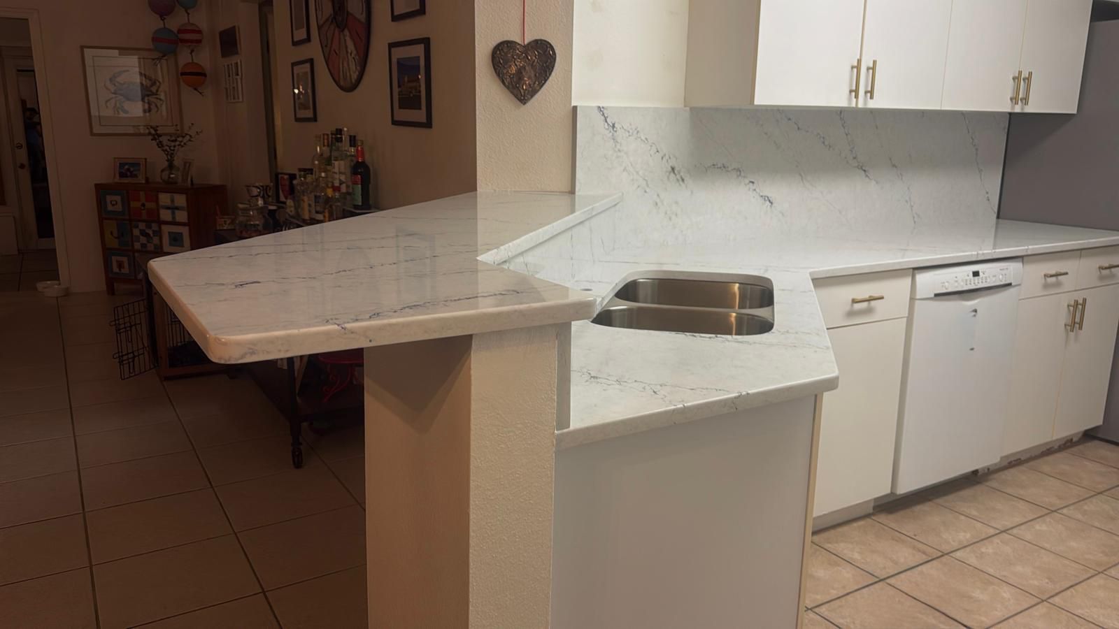 After: Tile-to-quartz kitchen transformation